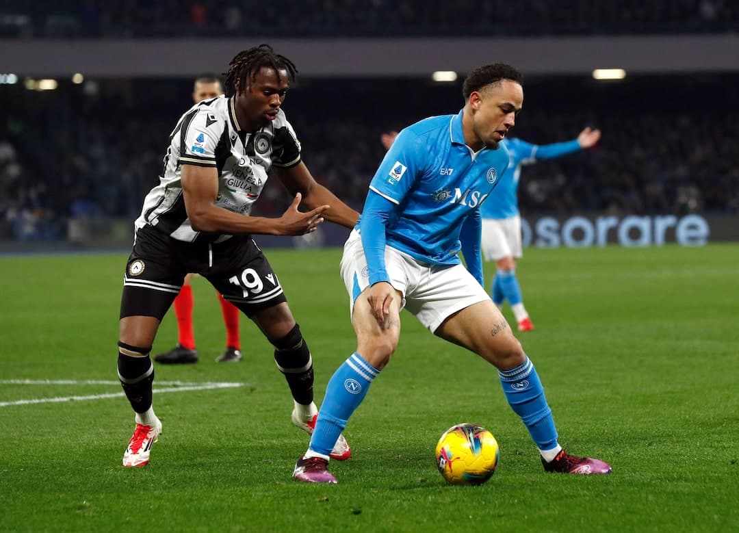 Napoli player challenged by Udinese opponent