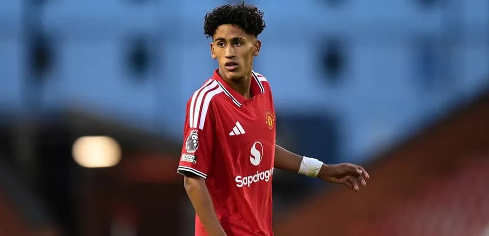 Player in red Manchester United kit during match