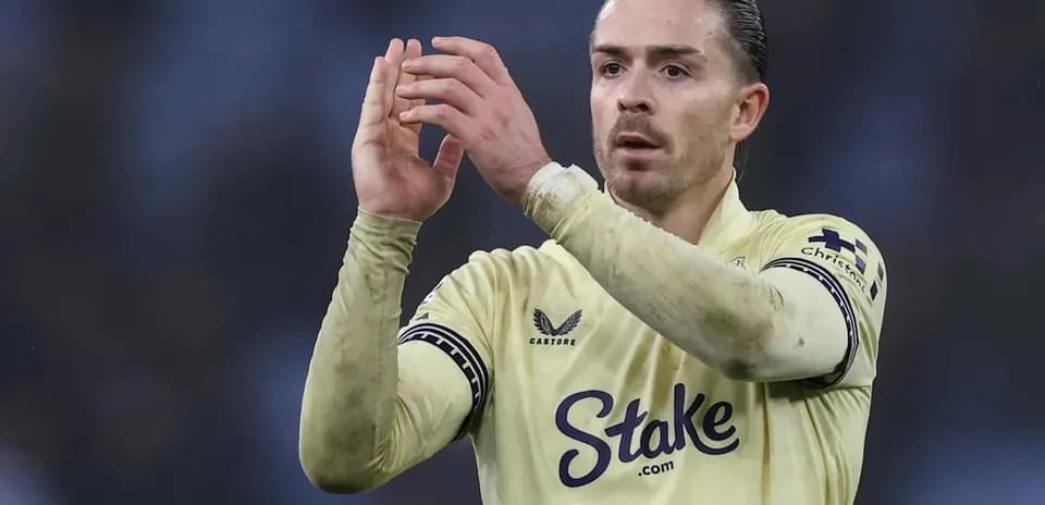 Player applauding fans wearing yellow jersey