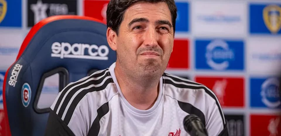 Manager speaking at press conference for Liverpool FC