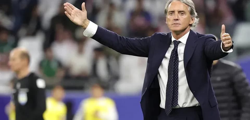 Coach gesturing during match on the sidelines