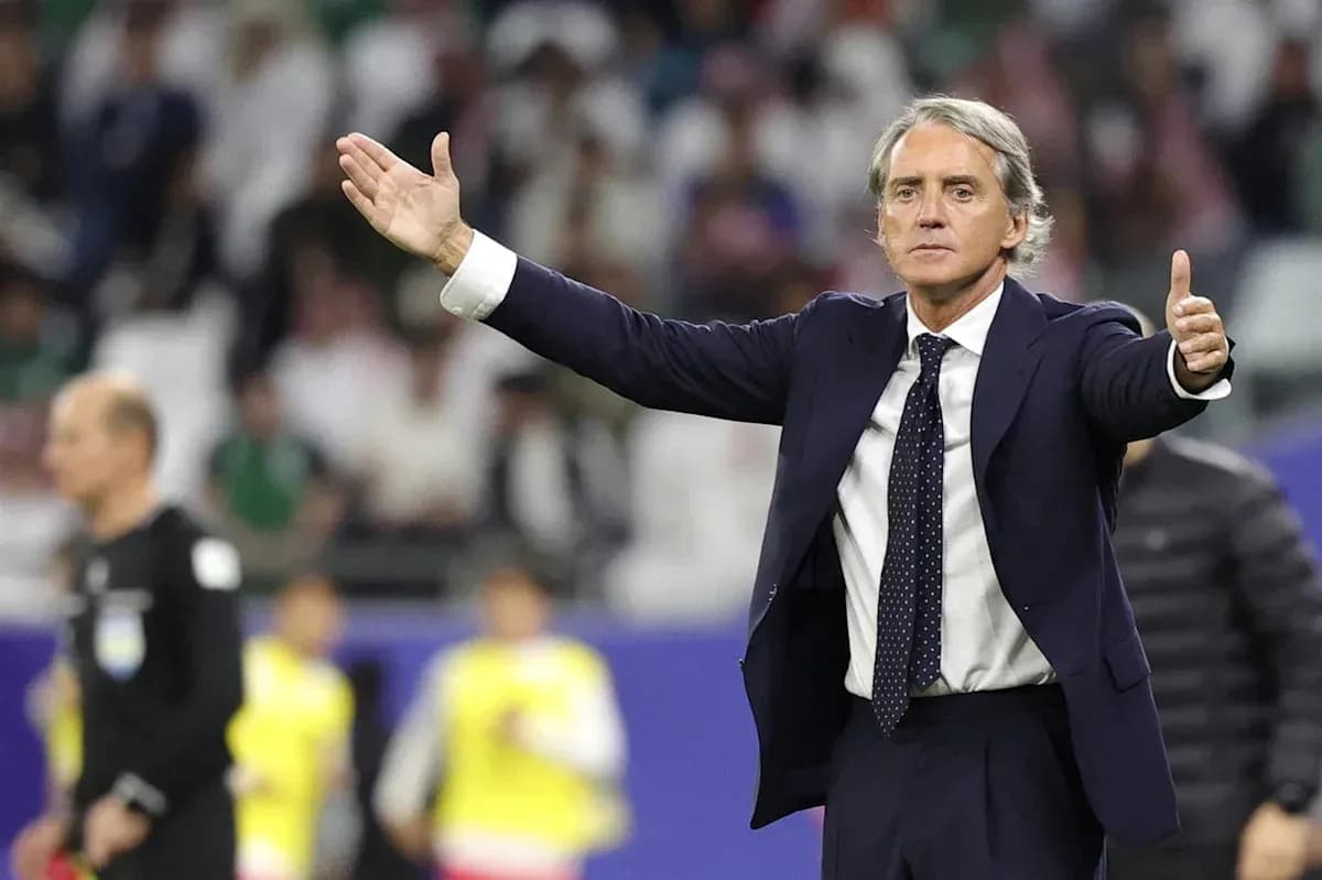 Coach gesturing during match on the sidelines
