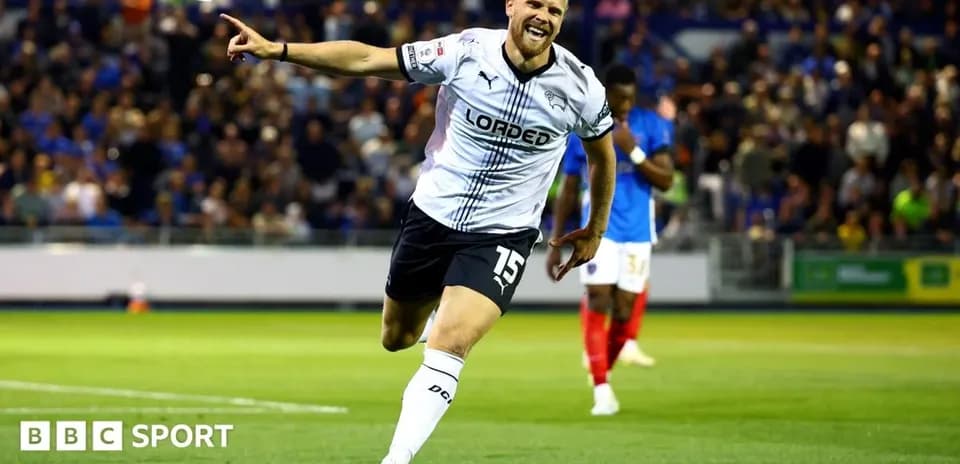 Player celebrating a goal during a football match
