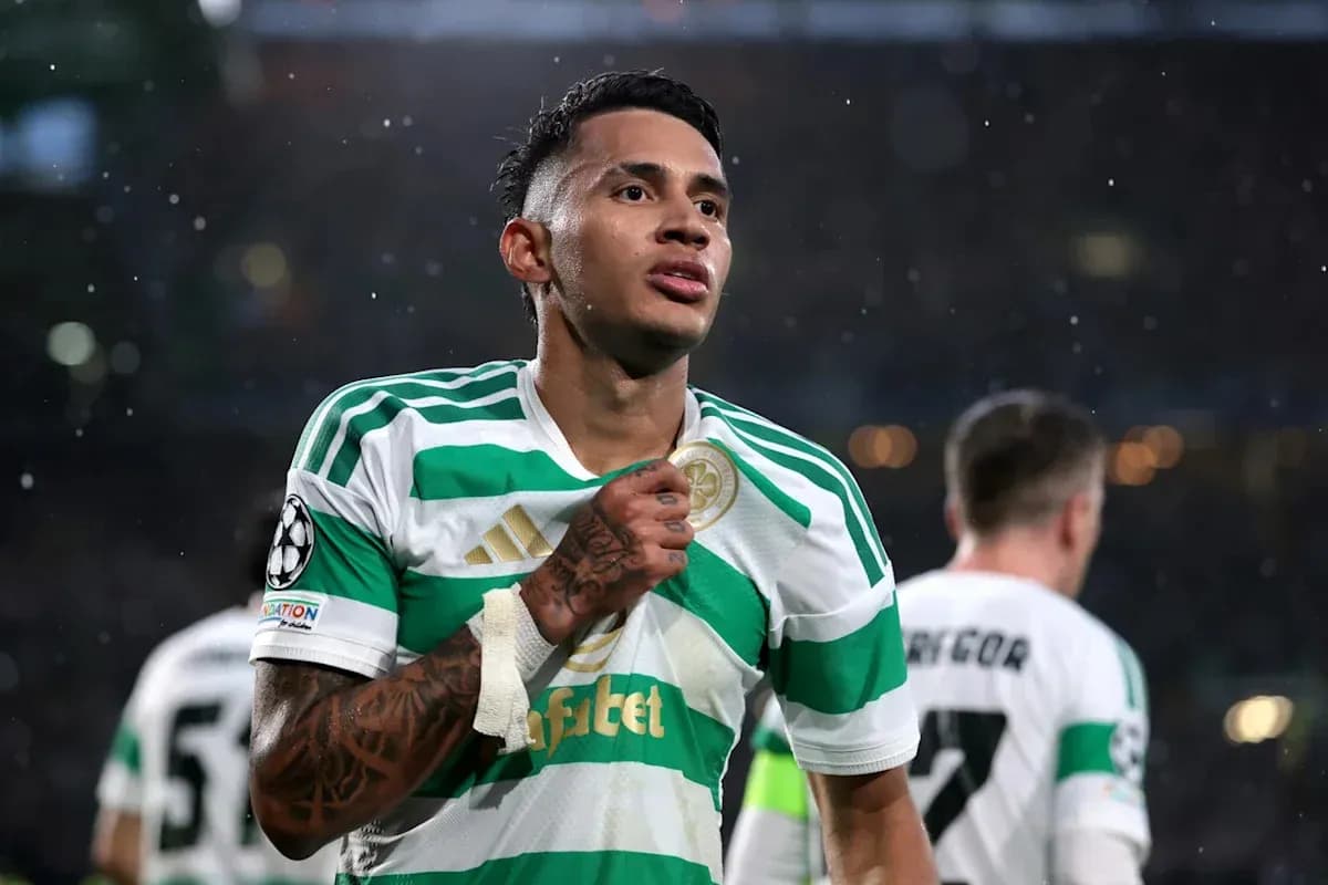 Player celebrating in Celtic's green and white jersey