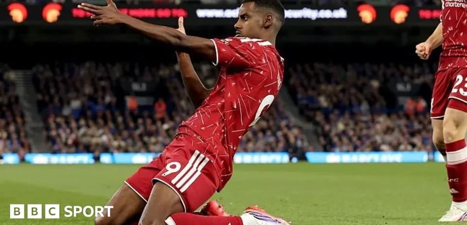 Player celebrating after scoring a goal on pitch
