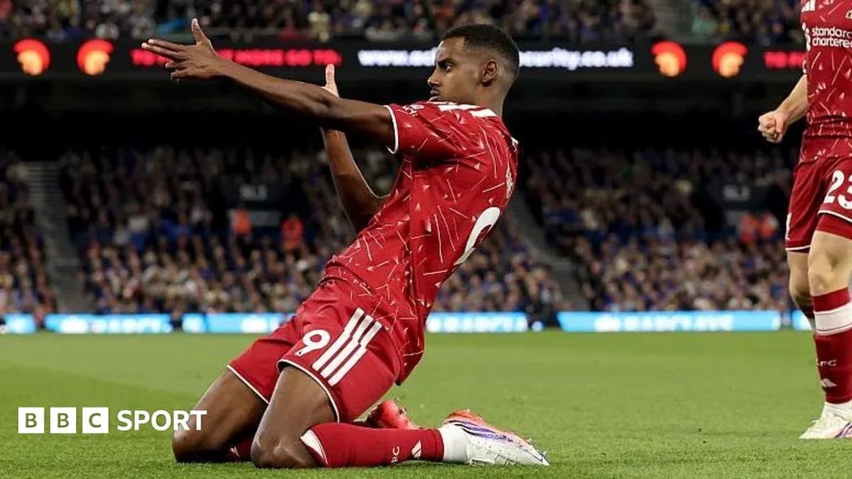 Player celebrating after scoring a goal on pitch