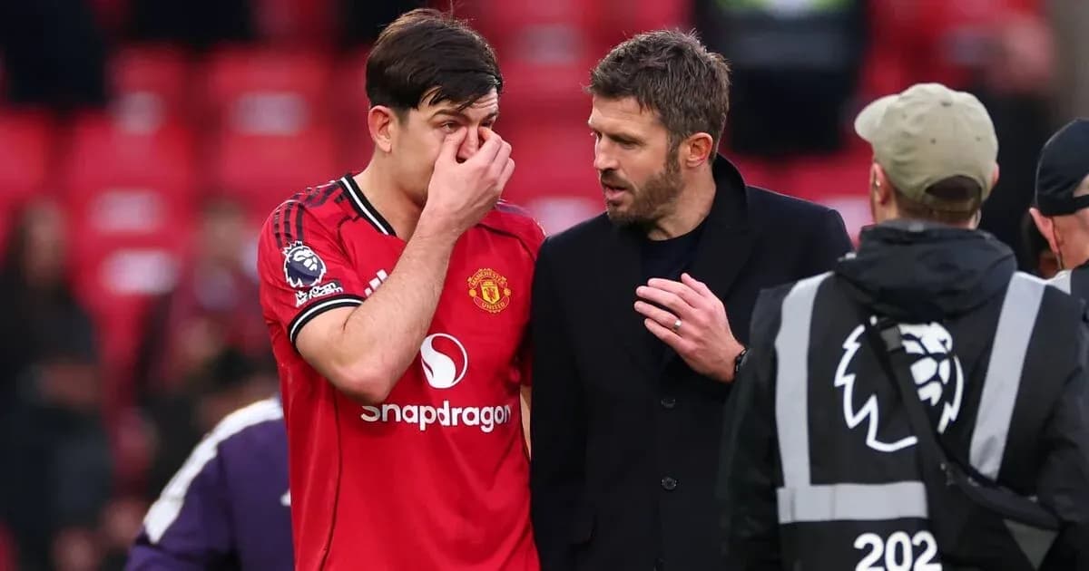 Player speaking with coach after match at stadium