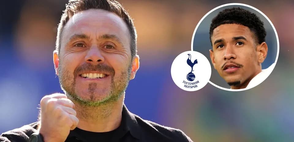 Coach celebrating with player from Tottenham Hotspur