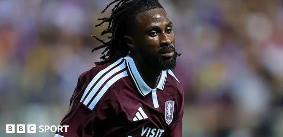 Player in maroon jersey during football match