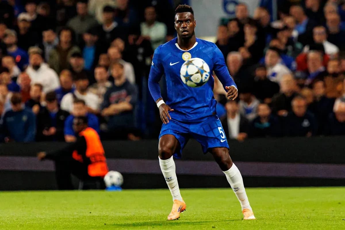 Player in blue jersey controlling the soccer ball