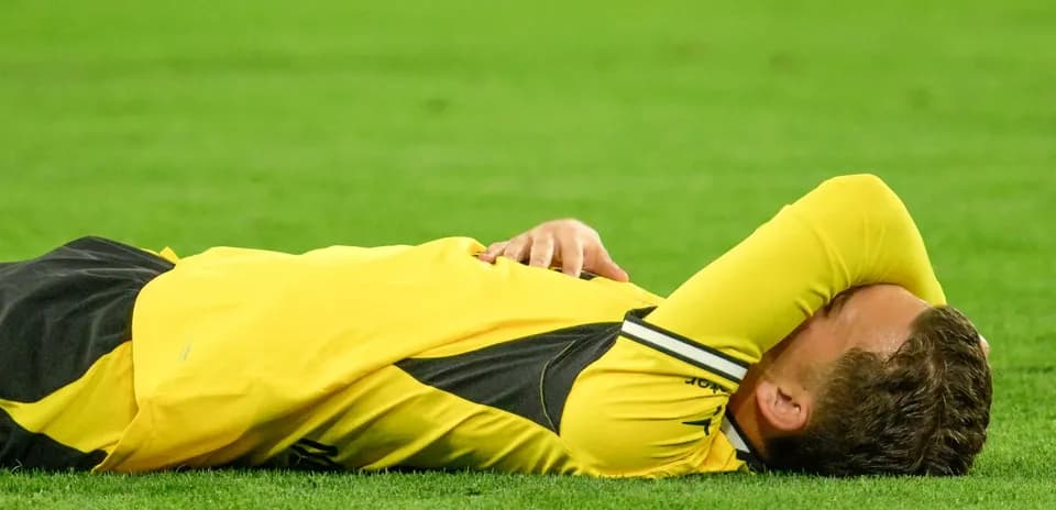 Player lying on the ground during a match