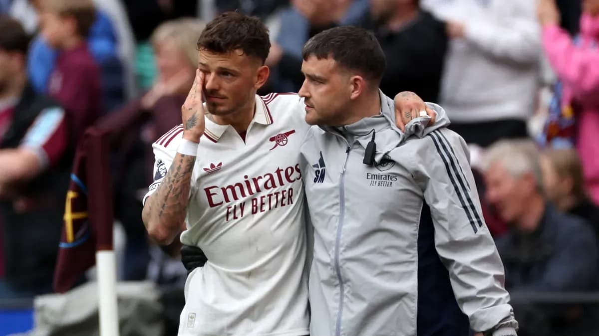 Player receiving support from teammate after match