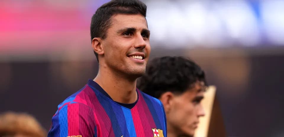 Barcelona player smiling during trophy celebration