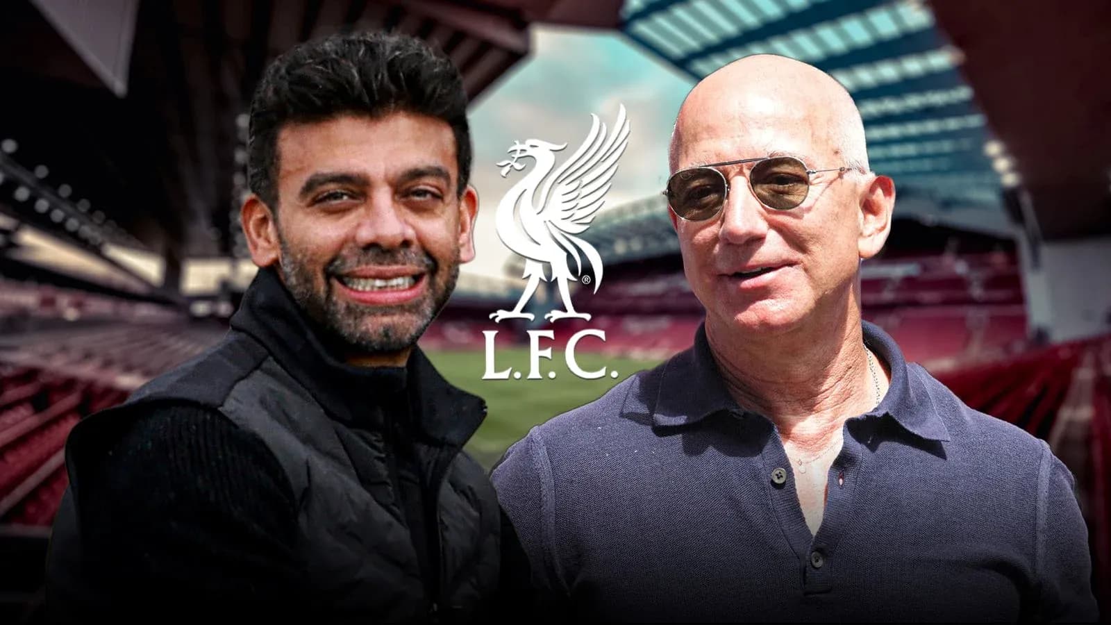 Two men smiling at Anfield stadium backdrop