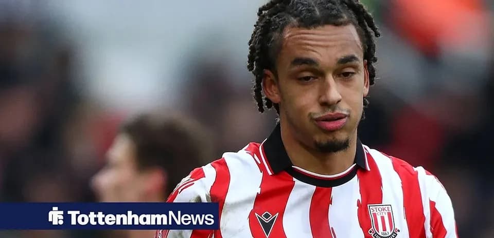Stoke City player wearing red and white striped jersey
