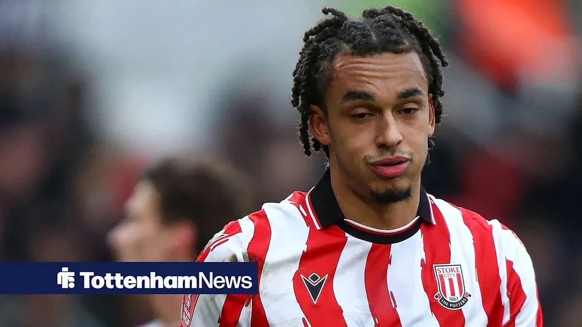 Stoke City player wearing red and white striped jersey