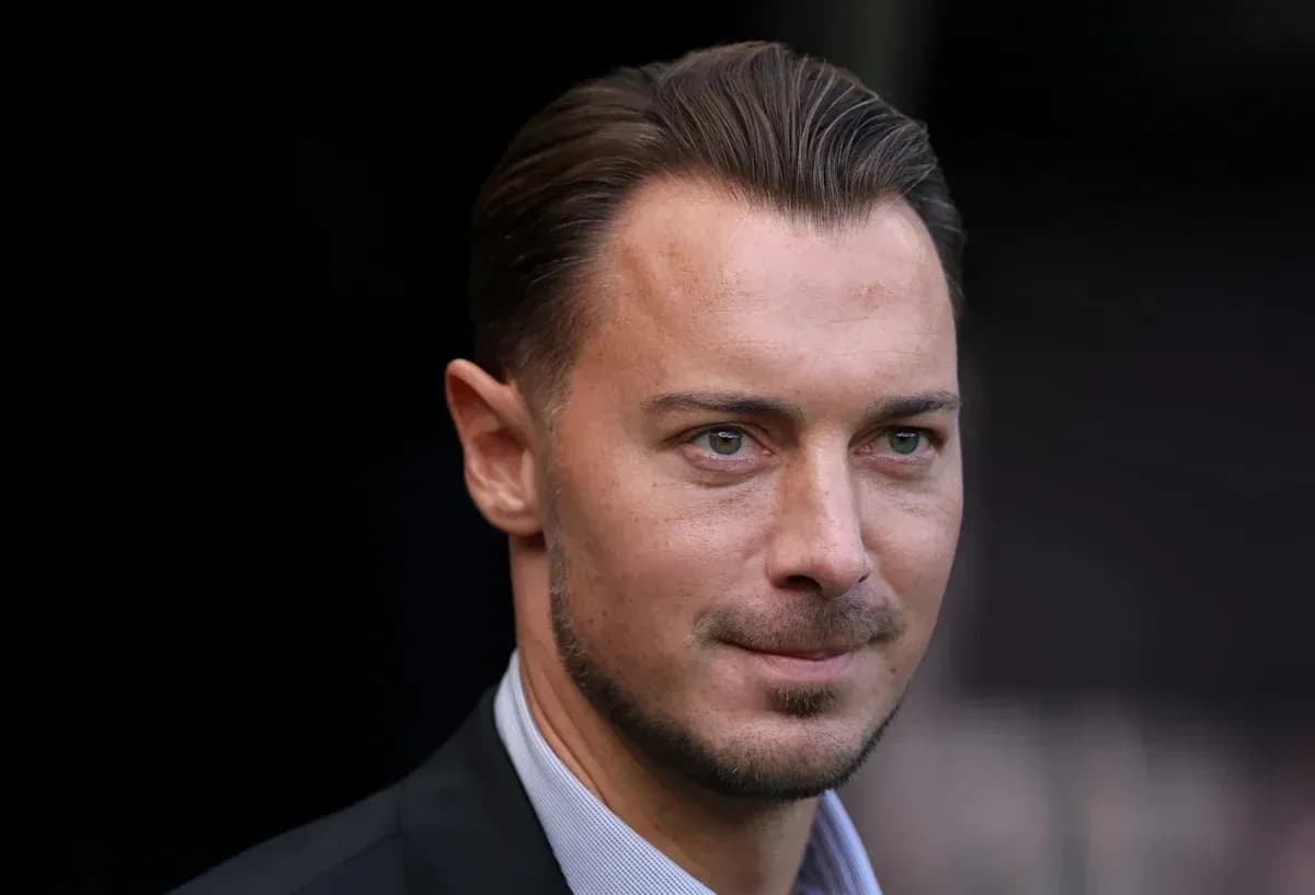 Man in suit looking directly at the camera