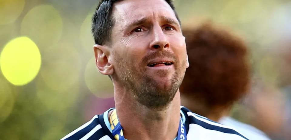Player with medal celebrating after match