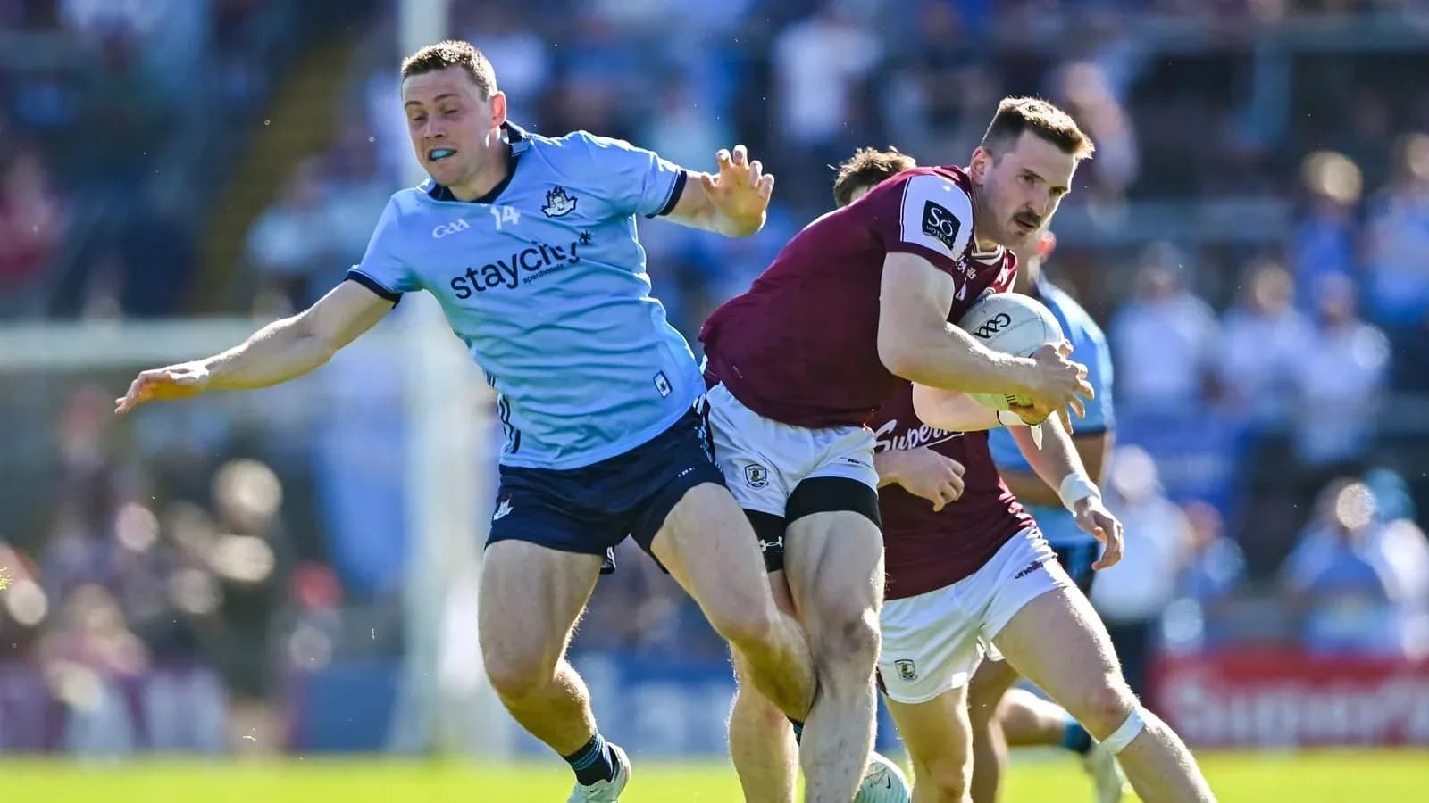 Dublin and Galway players contesting for possession during match