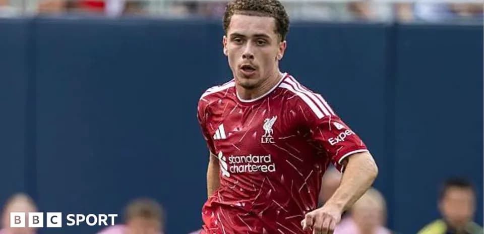 Liverpool player running during match action