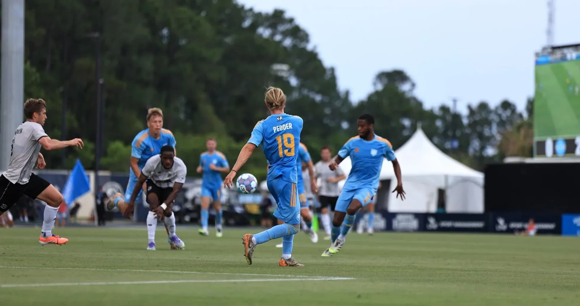 Player with ball during Sporting JAX match