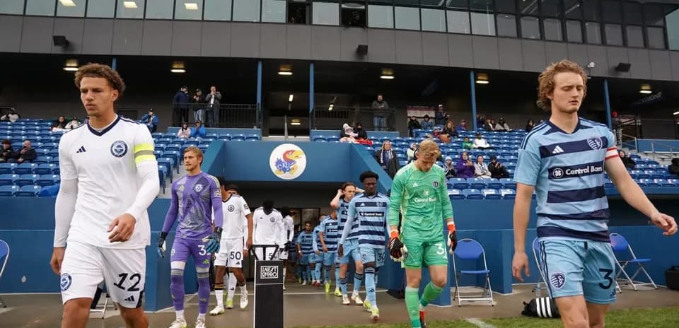 Players entering the field before match