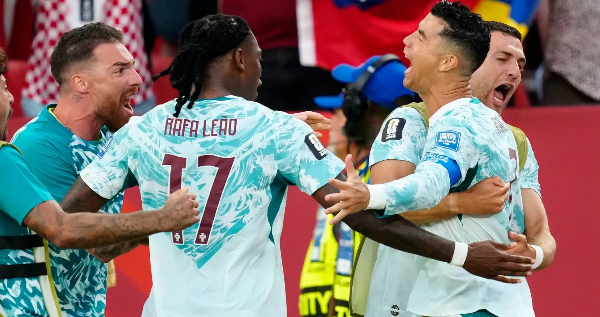 Portugal players celebrating a goal in match