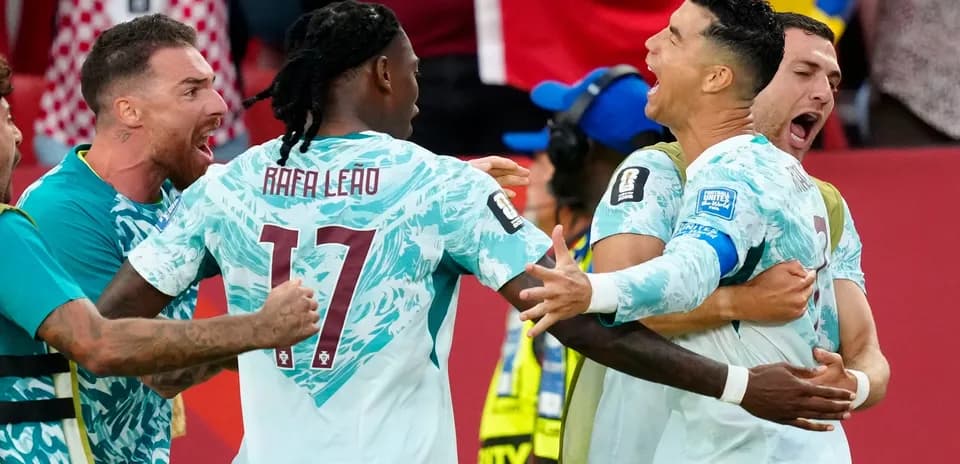 Portugal players celebrating a goal in match