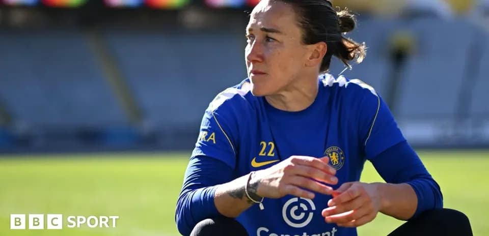 Female player in Chelsea training kit on pitch