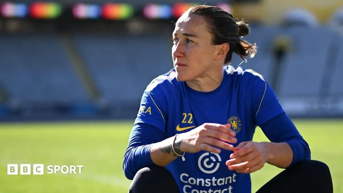 Female player in Chelsea training kit on pitch