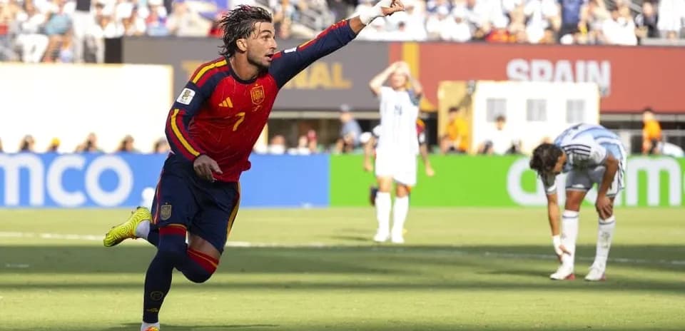 Spain player celebrating goal during match against Argentina