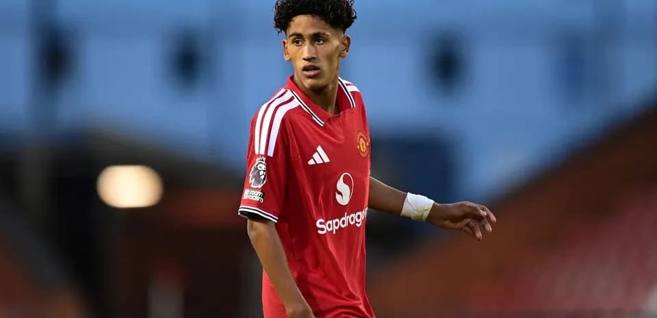 Player in red Manchester United kit during match