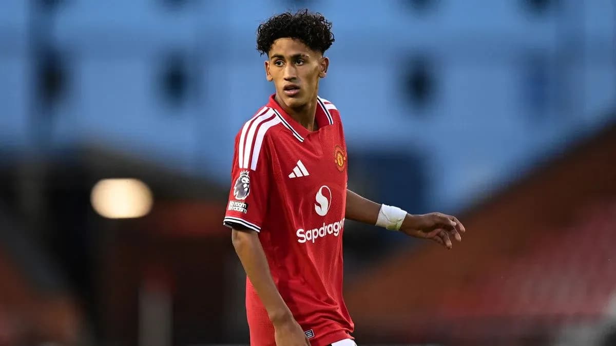 Player in red Manchester United kit during match
