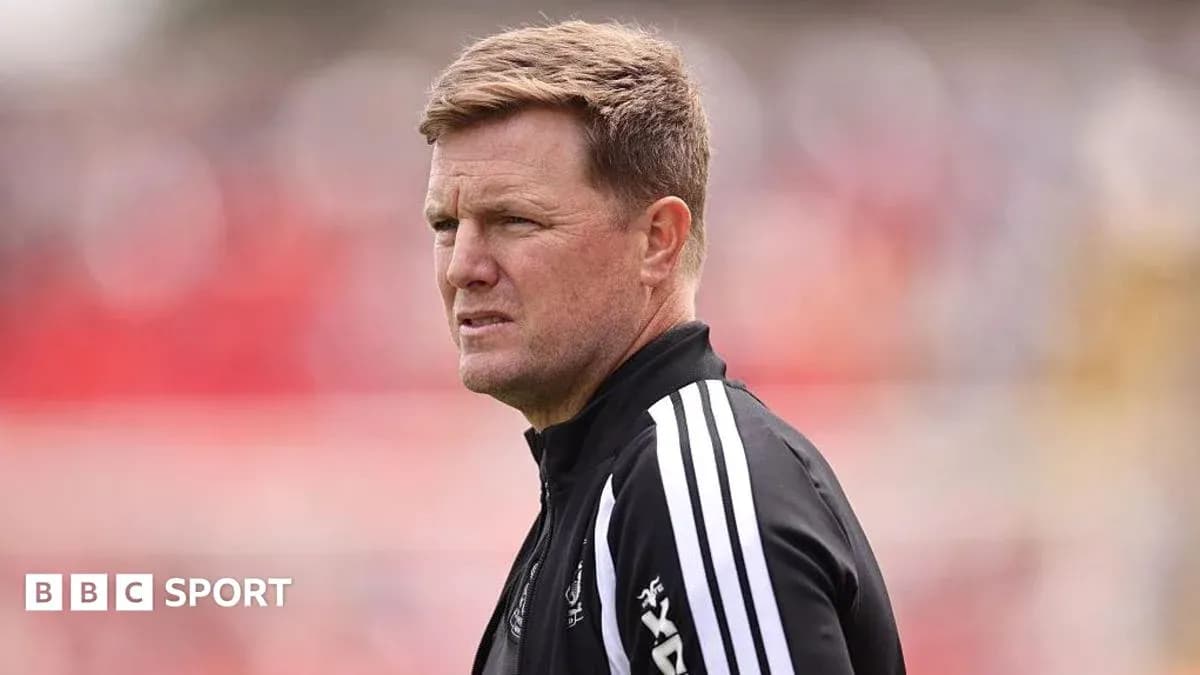 Coach observing the field during a match