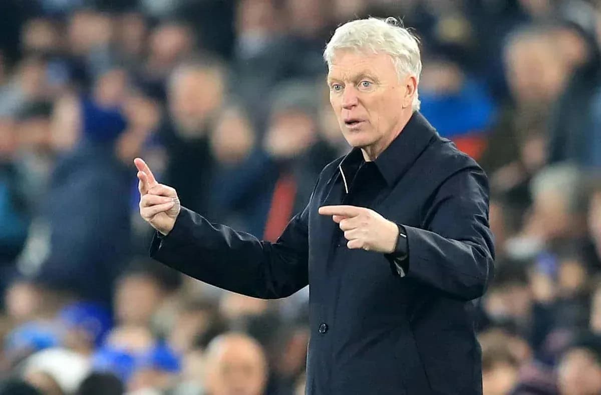 Manager gesturing during a football match