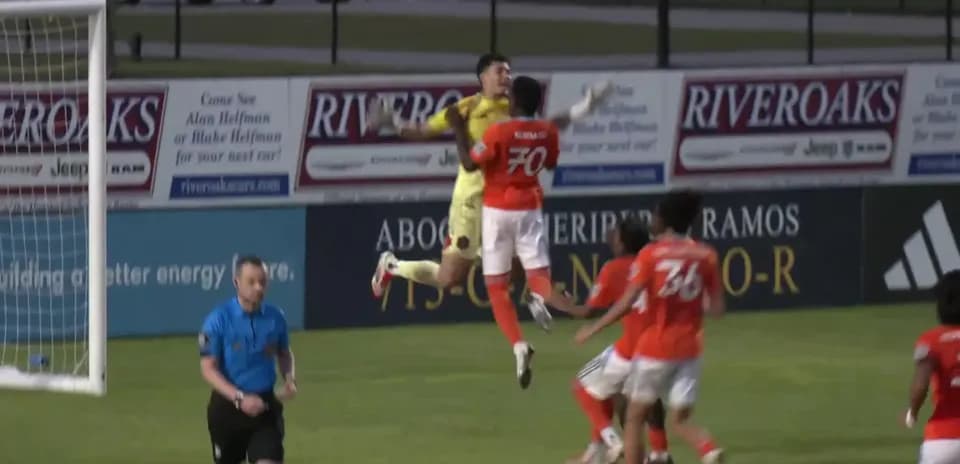 Goalkeeper making a save during match