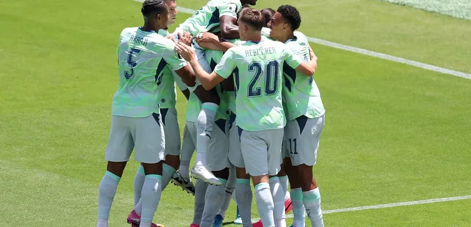 Players celebrating a goal during Qatar vs Switzerland