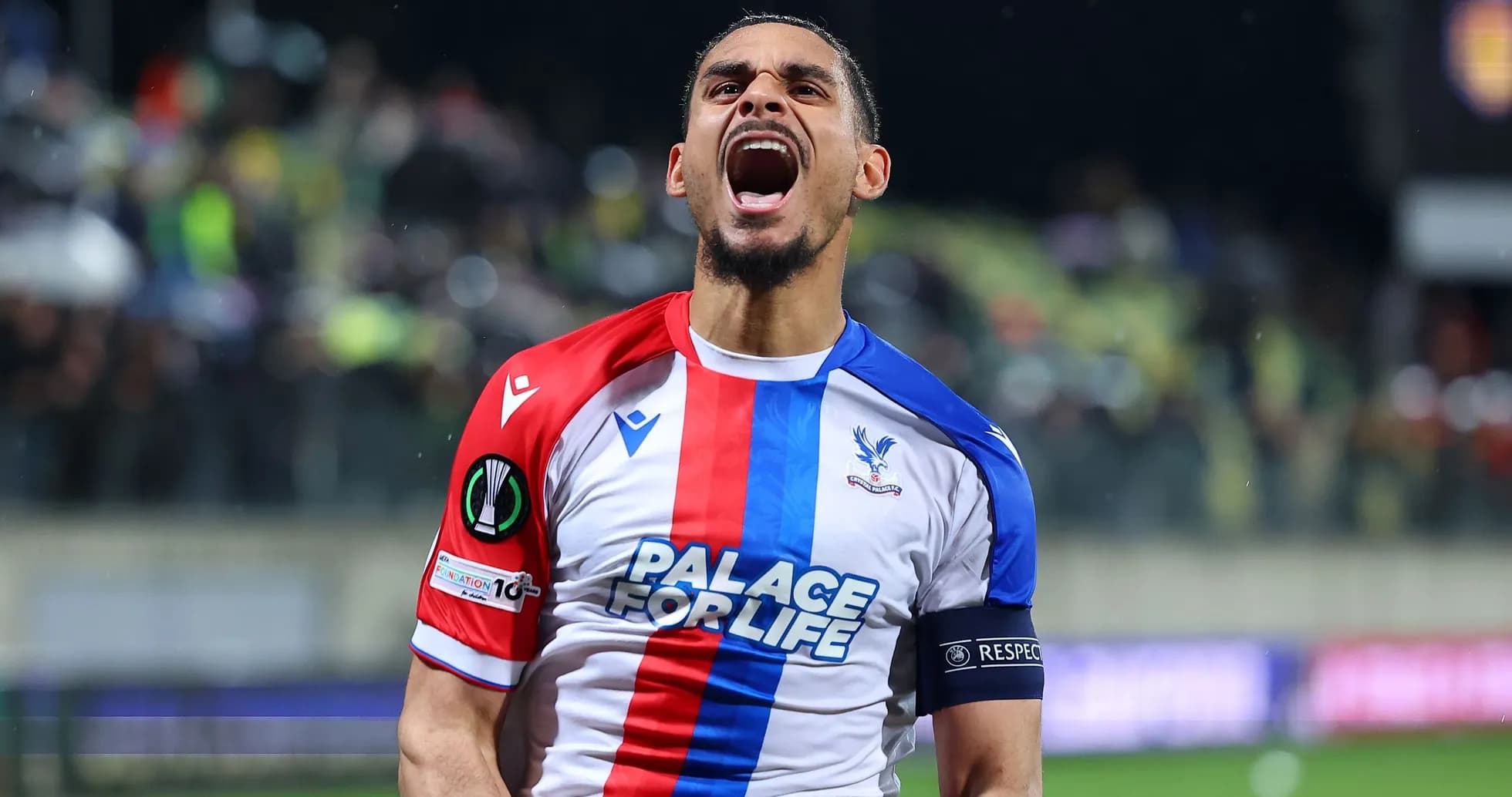 Player celebrating in Crystal Palace jersey on pitch