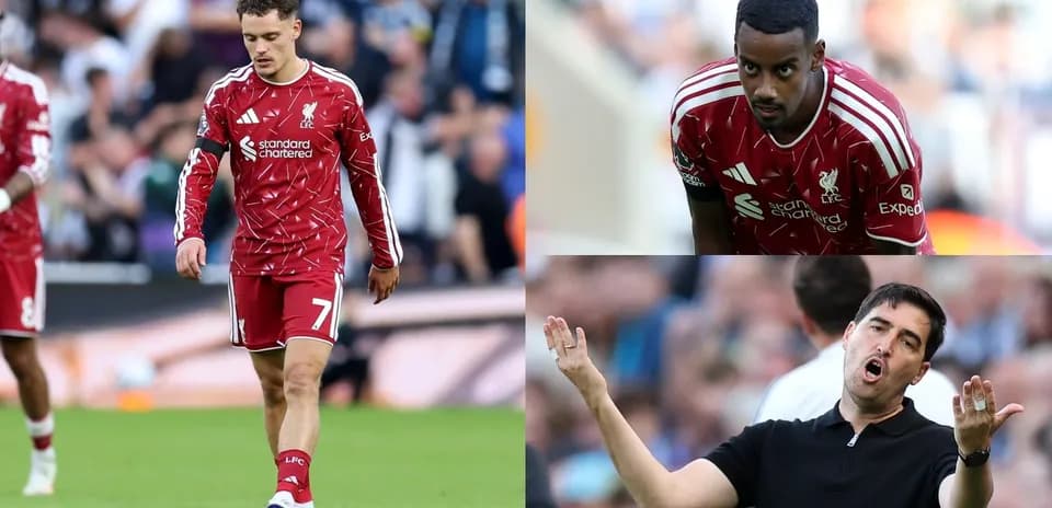 Liverpool players and coach during match action