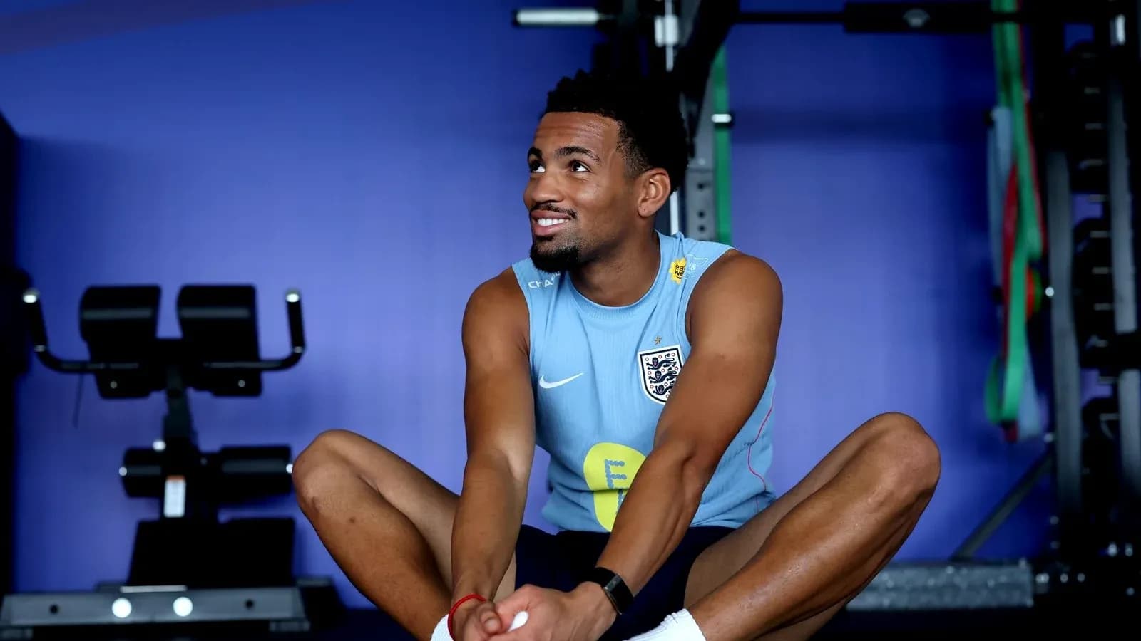 Athlete stretching in gym during training session