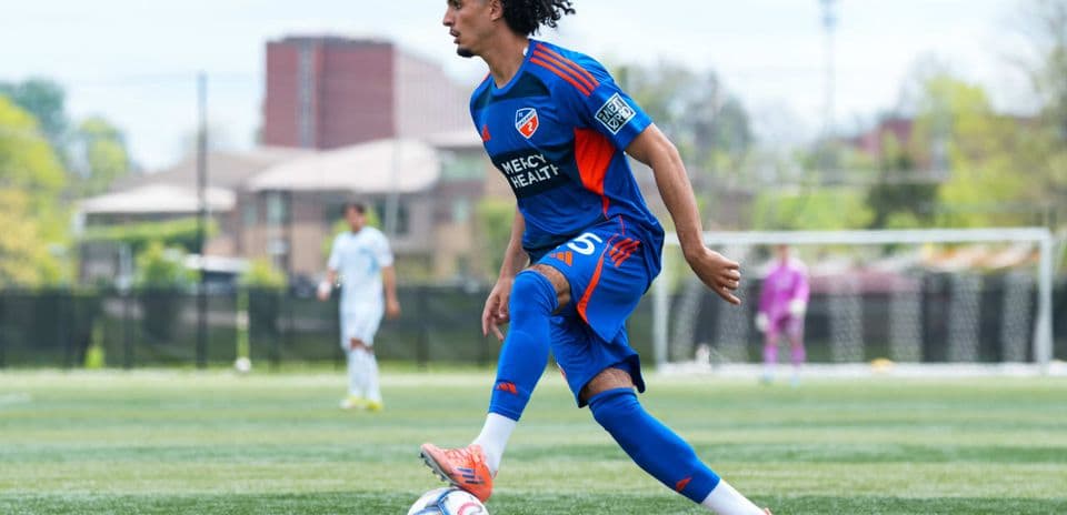 Player dribbling ball during New York City II match