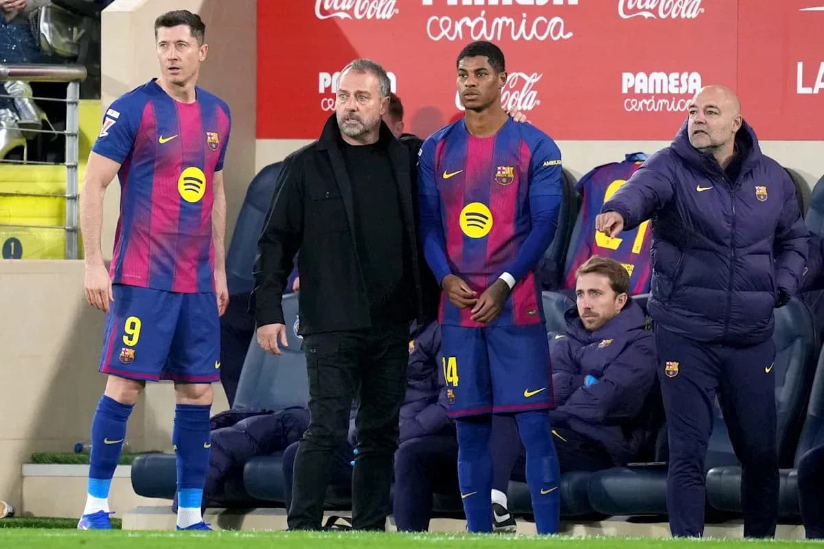 Barcelona players and coaching staff during match substitution