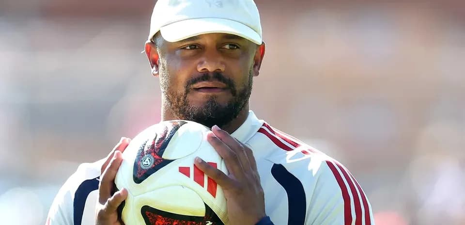 Player holding a football during training session