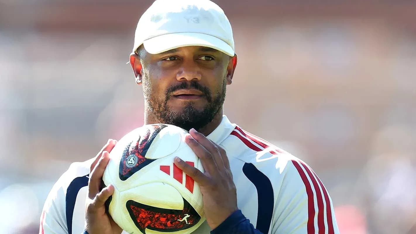 Player holding a football during training session