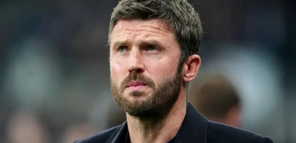 Coach looking thoughtfully during match