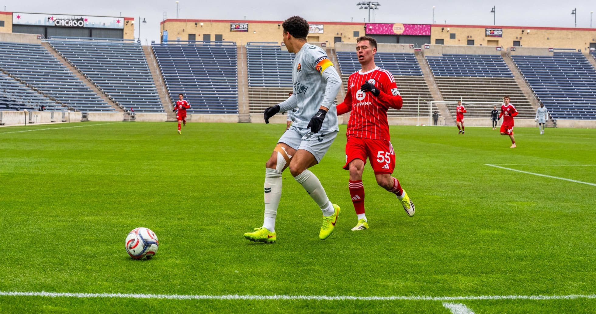 Player dribbling ball during Carolina Core match