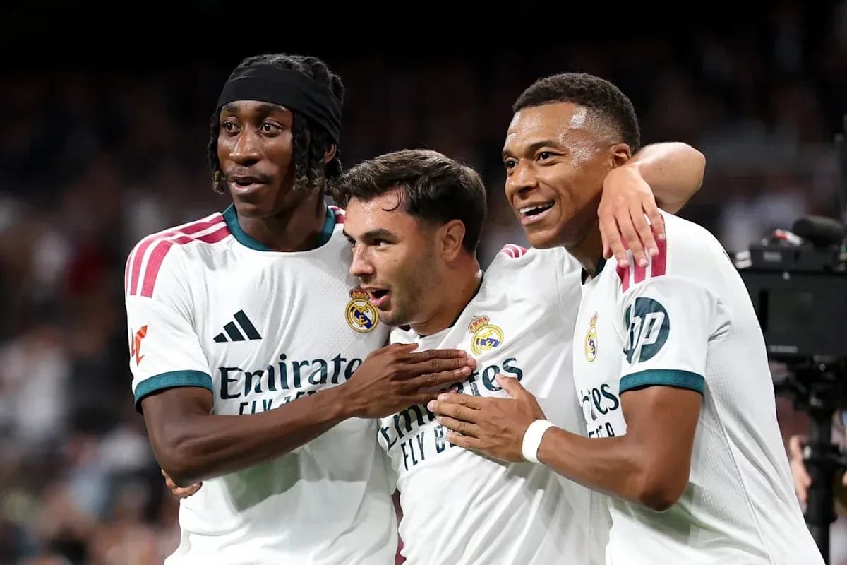 Real Madrid players celebrating together on the field