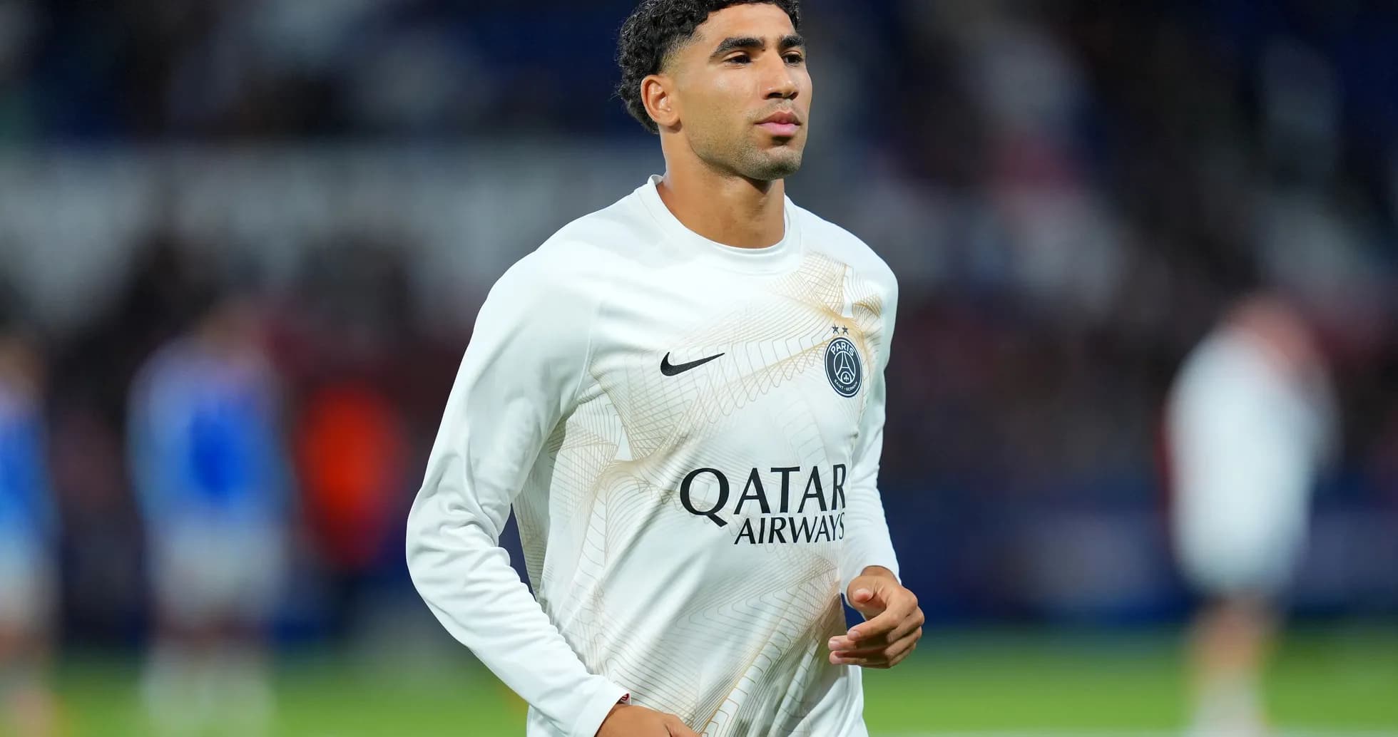 Player warming up in PSG training kit