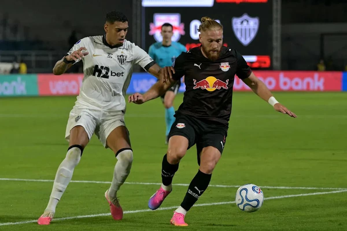 Two players contesting the ball during a match