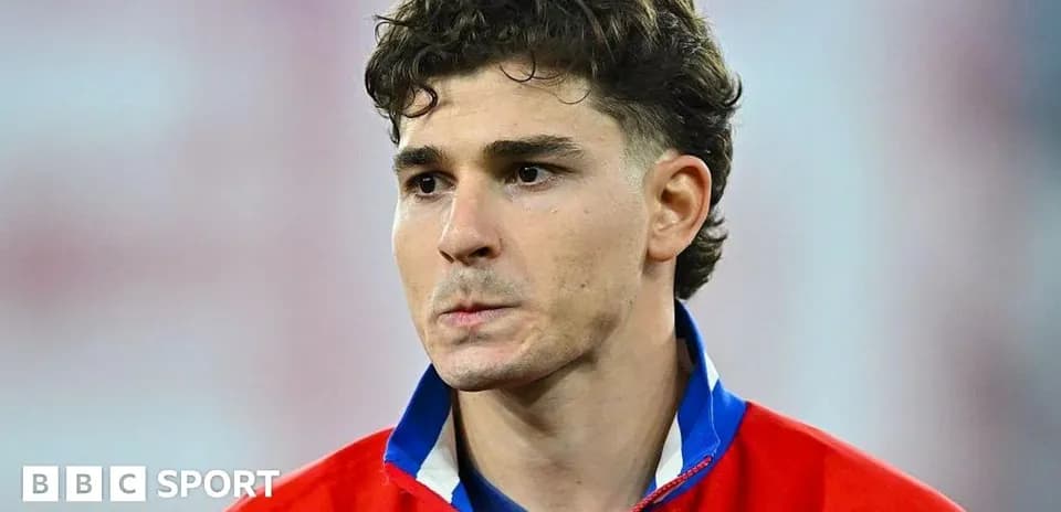 Player in national team jersey during match preparation